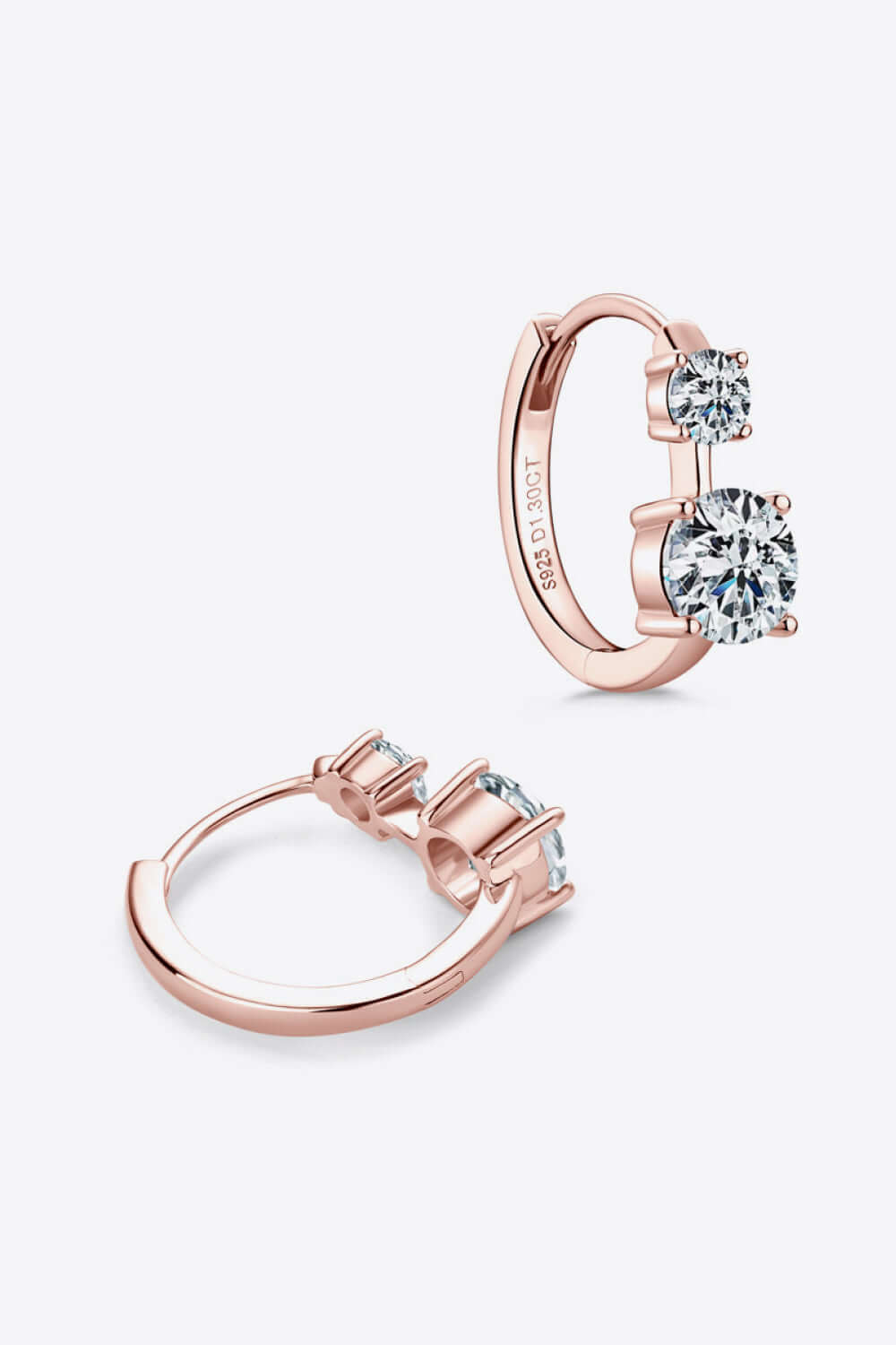 1.3 carat moissanite earrings in 925 sterling silver with 18K rose gold plating, featuring a matching box and certification.