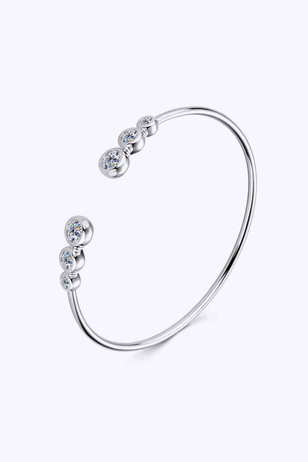 1.8 carat moissanite bracelet in 925 sterling silver with platinum and 18K gold plating, elegant design with five sparkling stones.