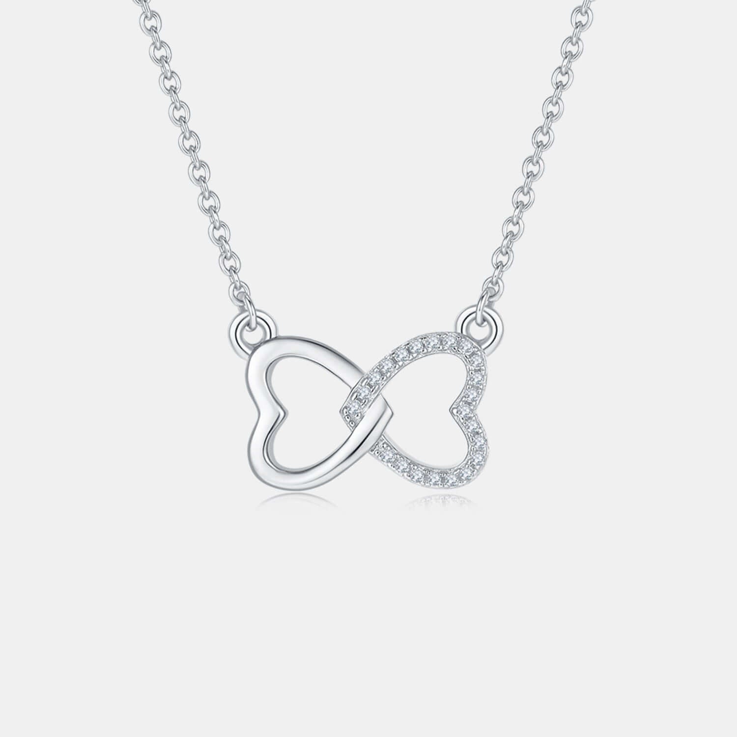 Elegant moissanite 925 sterling silver heart bow necklace with intertwined heart design, rose gold-plated and gold-plated accents.