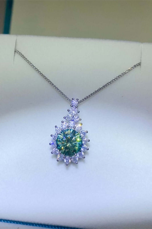 3 Carat Moissanite Sterling Silver Pendant Necklace in jewelry box, featuring shimmering gemstone and delicate chain.