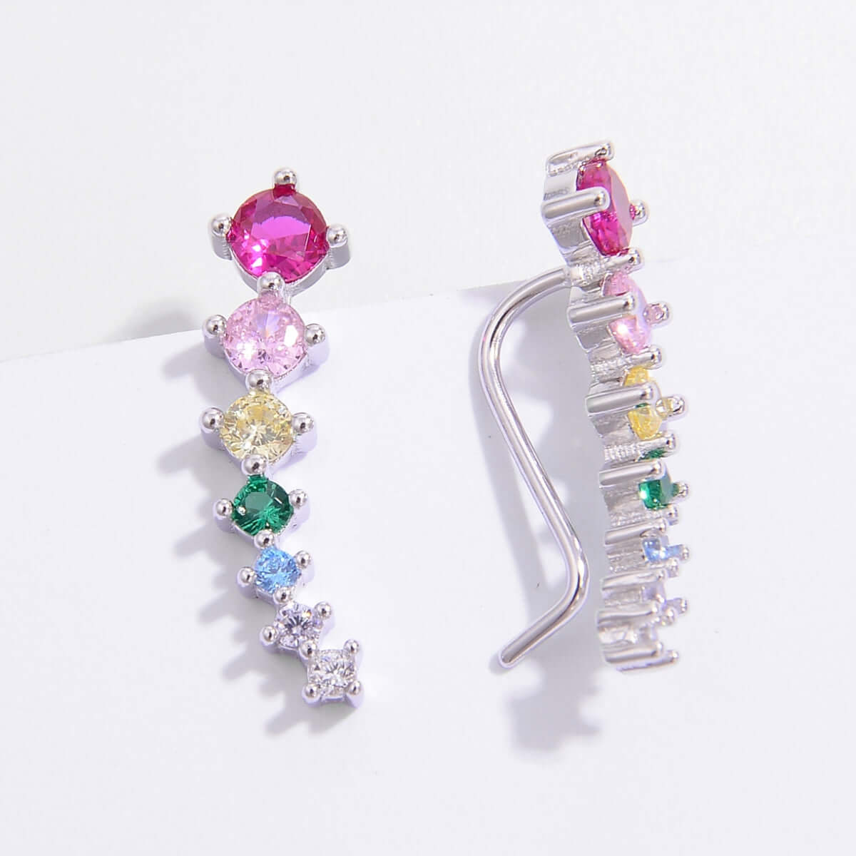 Platinum-plated 925 sterling silver earrings with colorful inlaid zircon gemstones, one pair displayed front and side view.