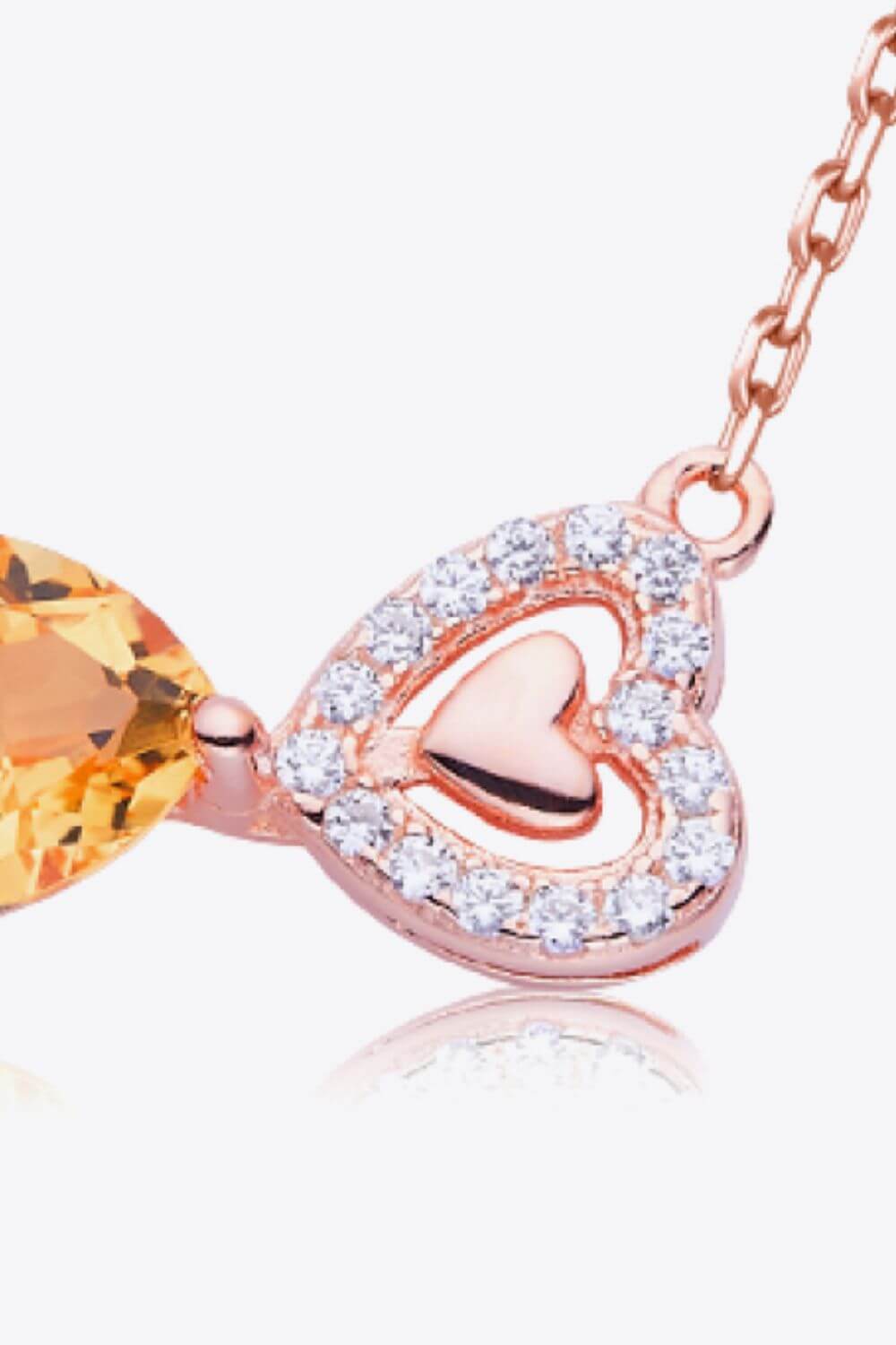 Citrine heart necklace with 925 sterling silver and 18K rose gold plating, featuring zircon accents on a delicate chain.