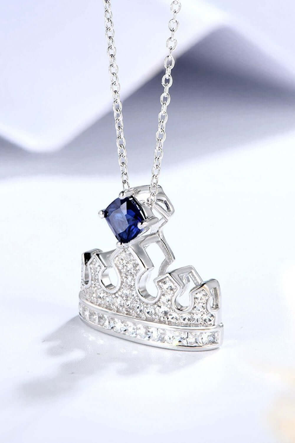 Zircon lab-grown sapphire crown shape pendant necklace in 925 sterling silver with platinum plating, minimalist style, 15.7 in chain.