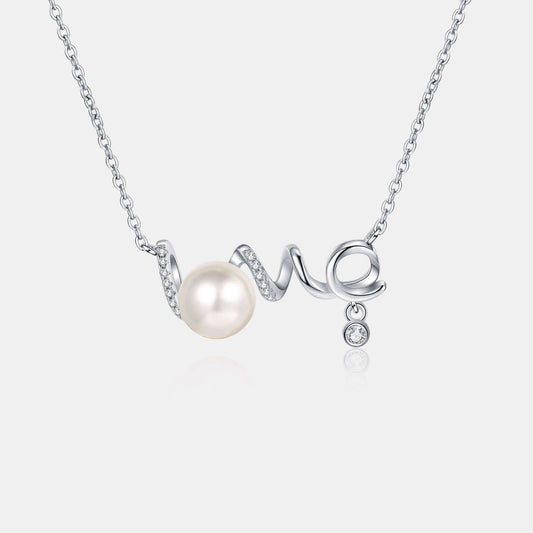 Elegant pearl and moissanite necklace on 925 sterling silver chain, featuring a delicate freshwater pearl and sparkling accents.