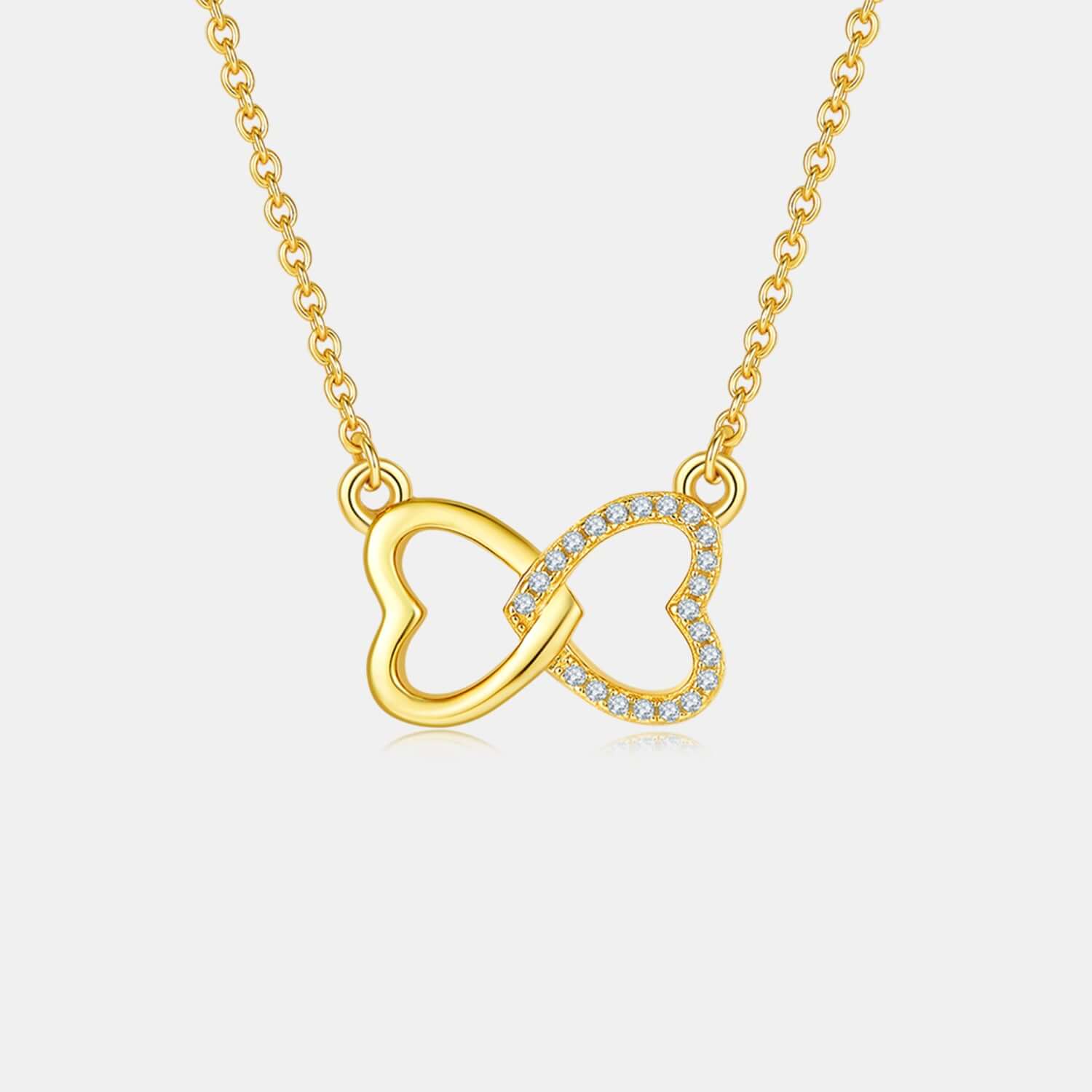 Moissanite 925 sterling silver heart bow necklace in gold-plated finish, featuring delicate and elegant design. Perfect gift jewelry.