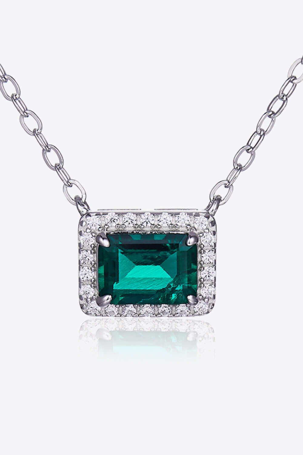 Minimalist lab-grown emerald rectangle pendant necklace on a platinum-plated sterling silver chain.