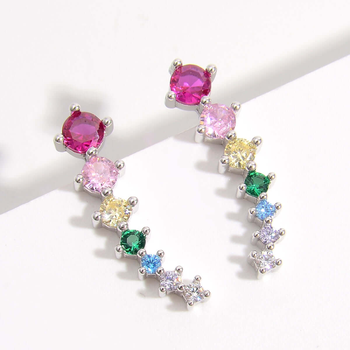 Colorful zircon studded 925 sterling silver earrings with platinum plating, featuring round gemstones, elegant and lightweight design.