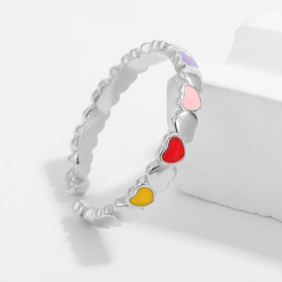 925 Sterling Silver Drip Oil Heart Ring with colorful heart-shaped accents on a white background