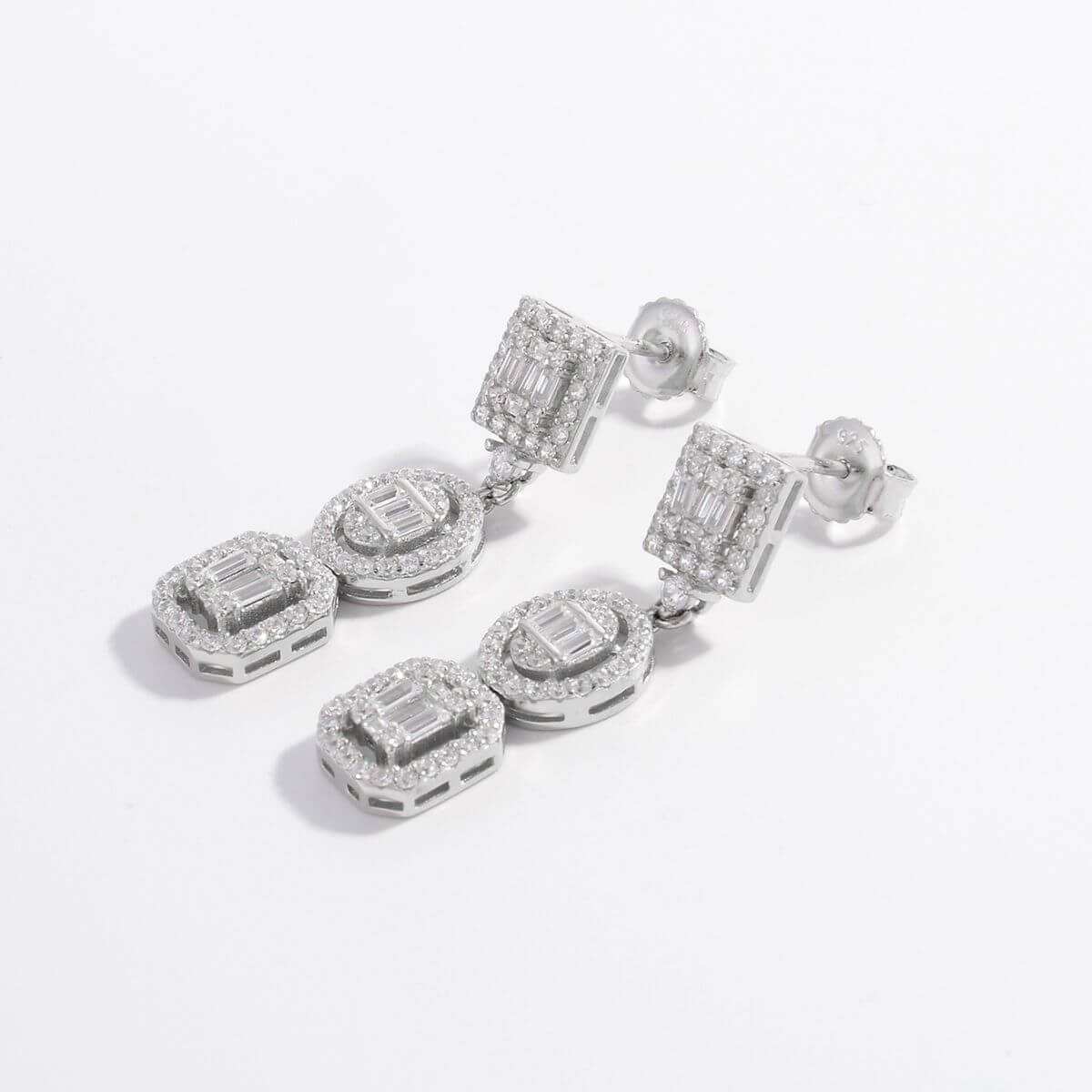 925 sterling silver earrings with inlaid zircon stones, featuring a geometric design. Length 1.3 in, weight 0.2 oz (4.95 g).