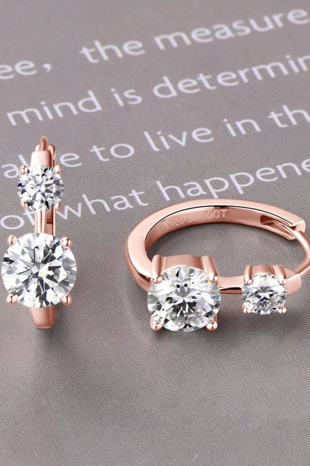 1.3 Carat Moissanite 925 Sterling Silver Earrings with Rose Gold Plating on Gray Background