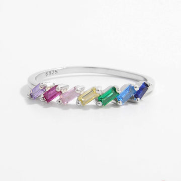 925 sterling silver ring with colorful zircon stones in a platinum-plated band displaying rainbow sequence.