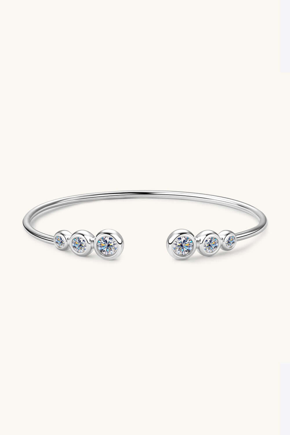 Elegant 1.8 carat Moissanite bracelet in 925 sterling silver, platinum-plated, featuring a sleek, open-ended design with sparkling stones.