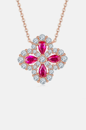 925 sterling silver lab-grown ruby flower-shaped necklace with sparkling accents and delicate chain, perfect for elegant occasions.