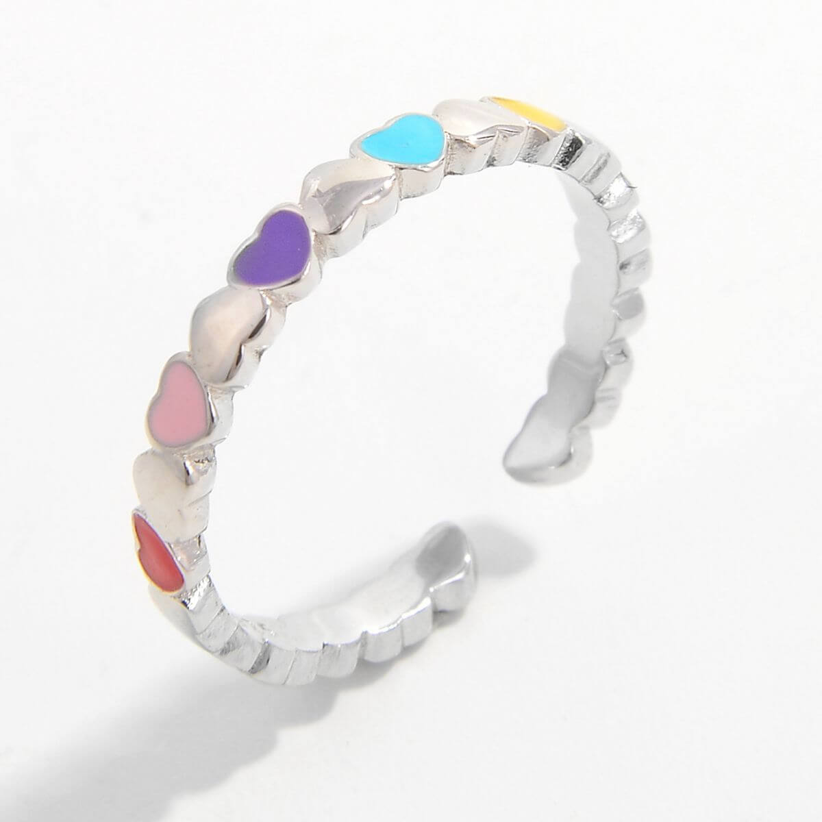 925 sterling silver drip oil heart ring with colorful heart designs on a white background