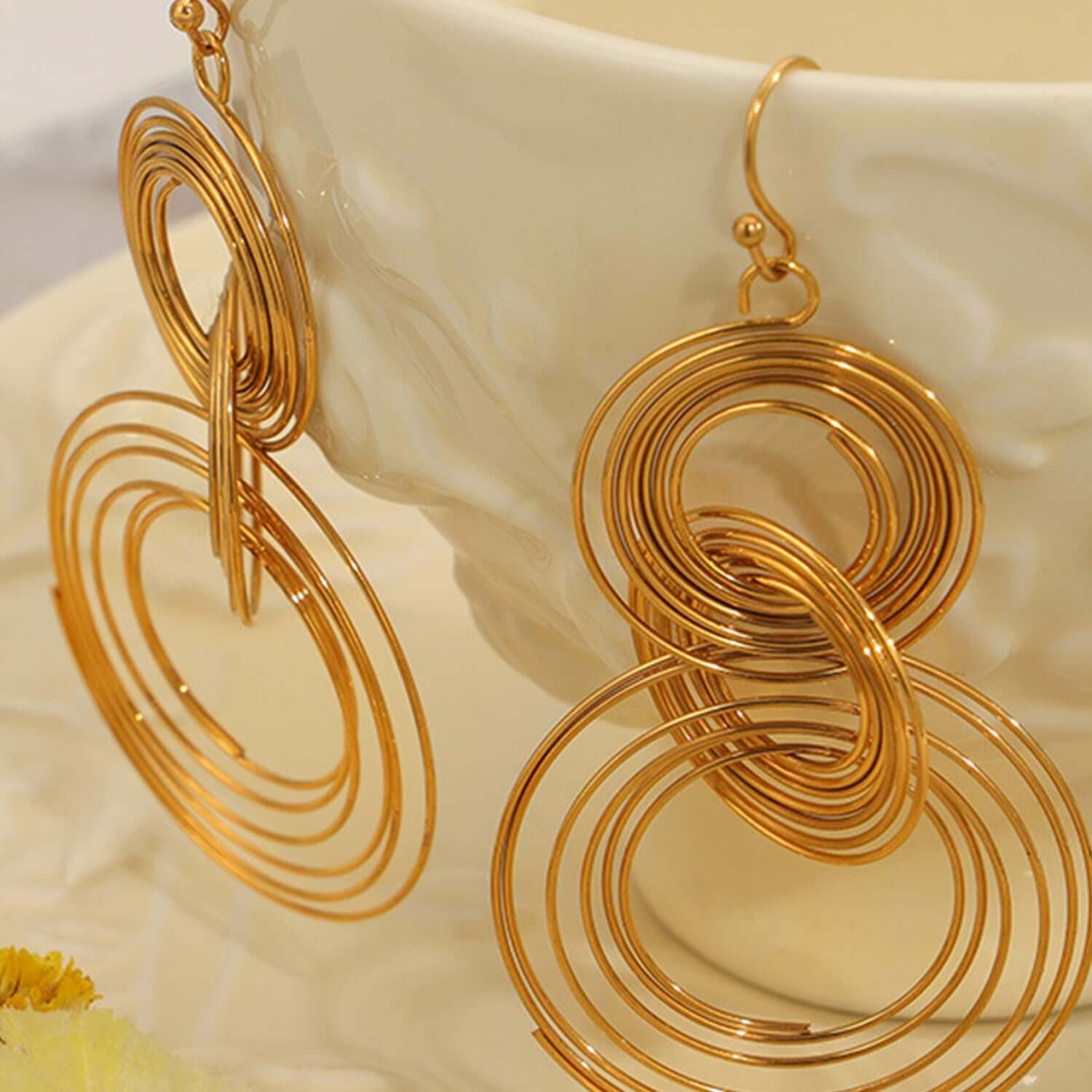 Titanium Steel Multi-Layered Round Shape Earrings in gold-plated titanium steel, durable and stylish jewelry for versatile wear.